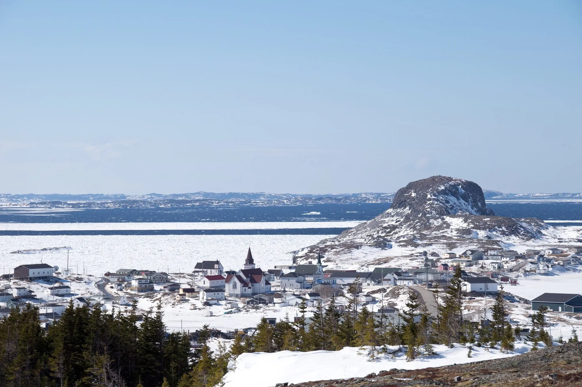 The town of Fogo under snow below Brimstone Head, seen from the Lion's Den Trail.